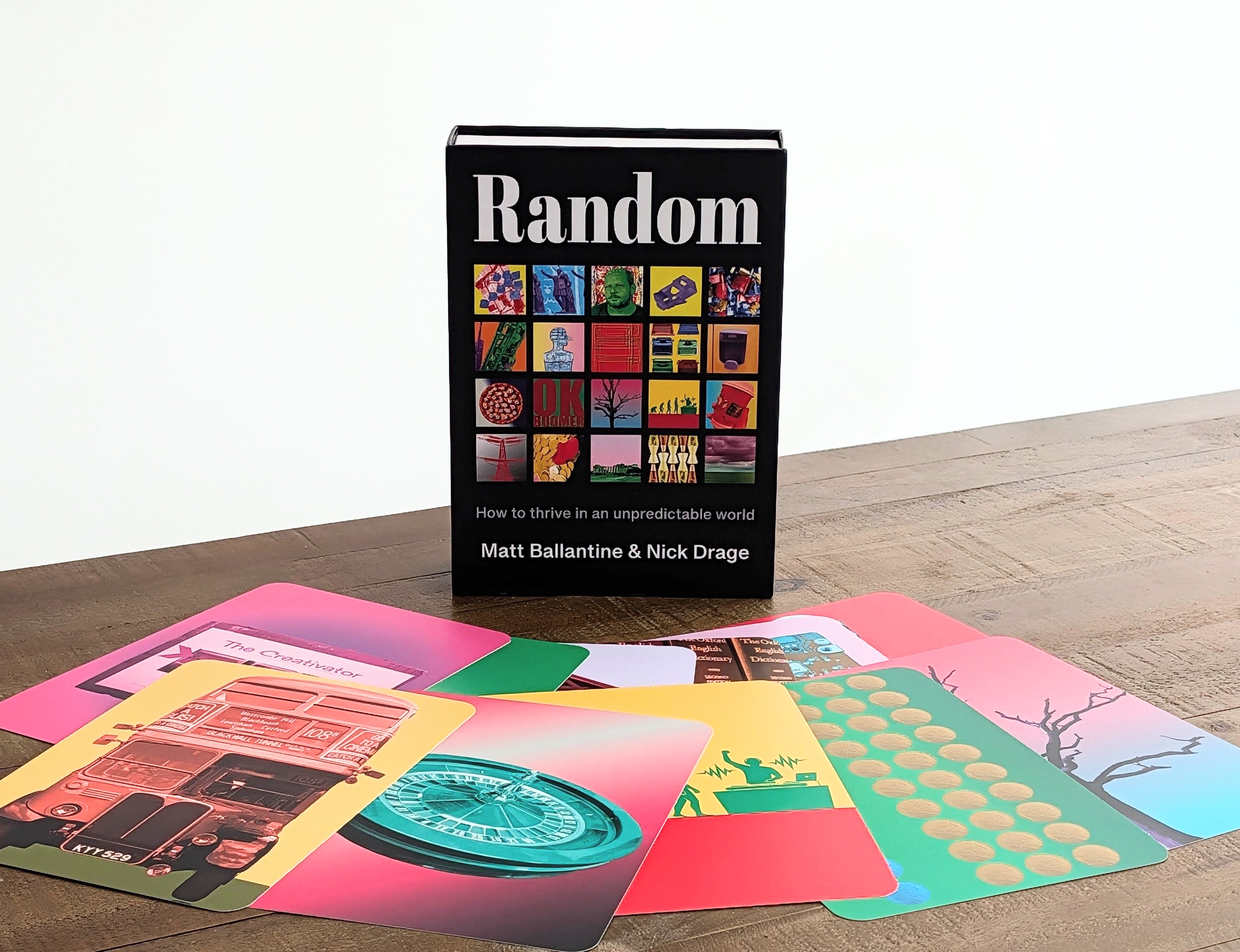 A copy of the book with some pages in front of it.